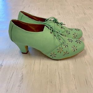 Green and gold heeled ankle boot